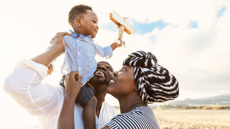 baby boy with family 