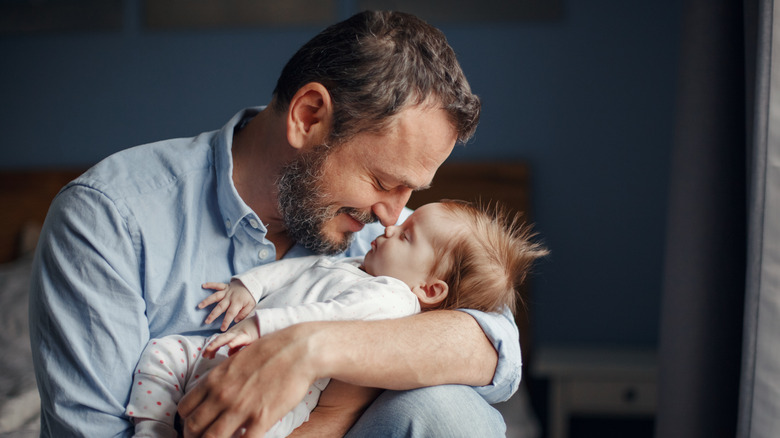 baby girl with dad 