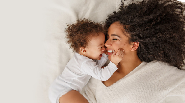 baby girl with mother 