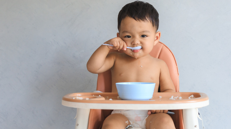 Baby eating cereal 