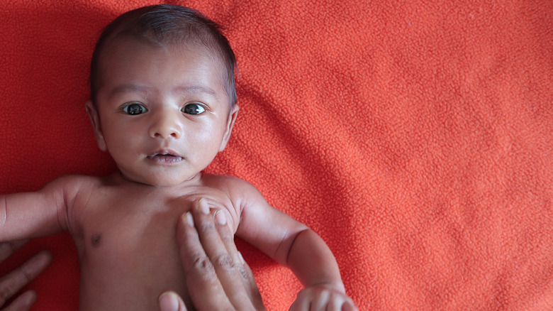 Baby staring at parent