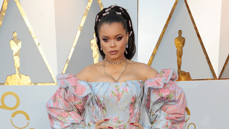 Andra Day posing on Oscars red carpet