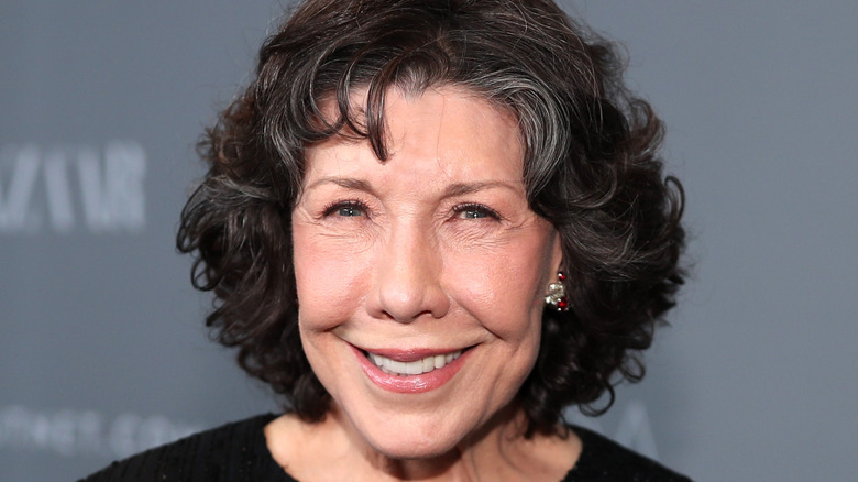 Lily Tomlin smiling at an event