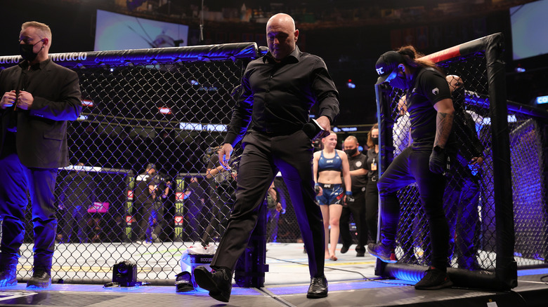 Joe Rogan walking out of octagon