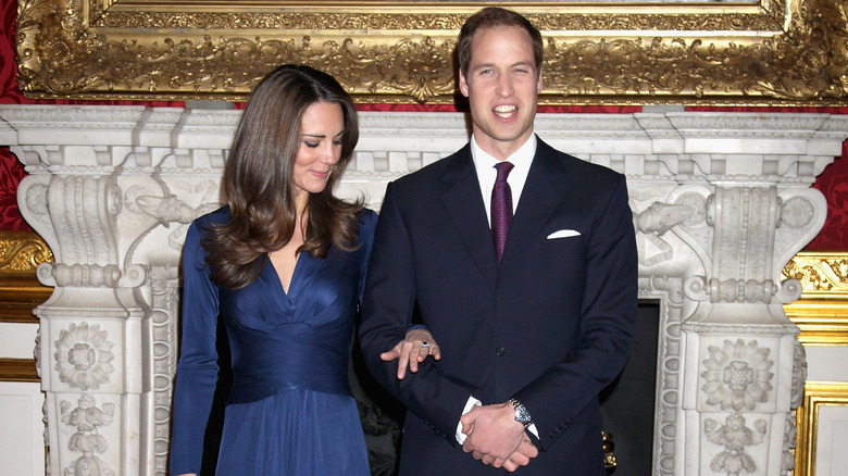 Kate Middleton and Prince William posing for photos