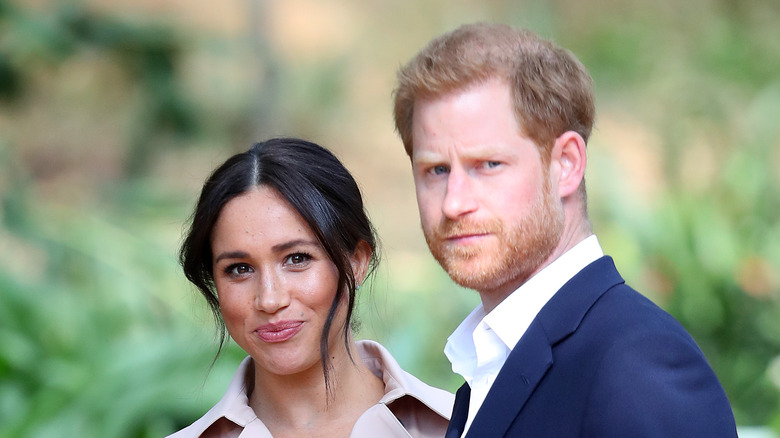 Meghan Markle and Prince Harry posing