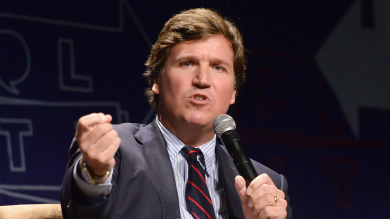 Tucker Carlson at a speaking engagement