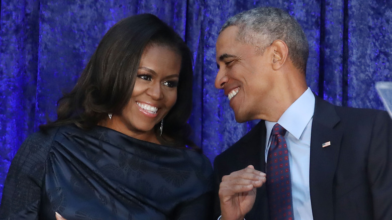 Michelle and Barack Obama smiling