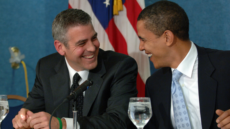 Geroge Clooney and Barack Obama laughing