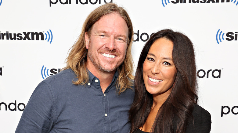 Chip and Joanna Gaines pose at an event