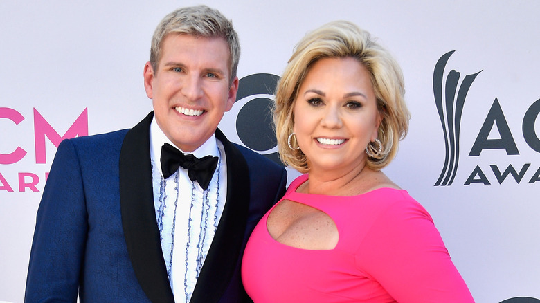 Todd and Julie Chrisley posing for photo