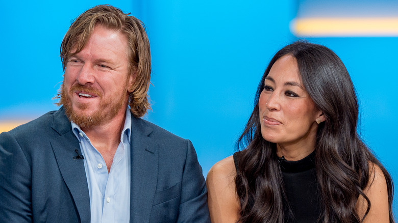 Chip and Joanna Gaines listen during an interview