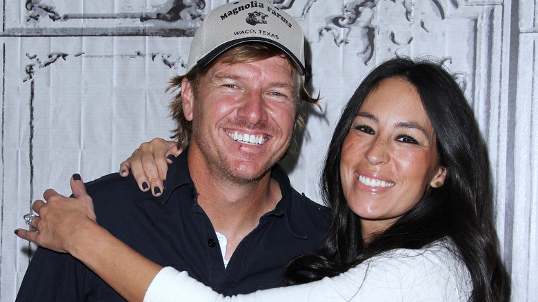 Chip and Joanna Gaines cuddle on the red carpet