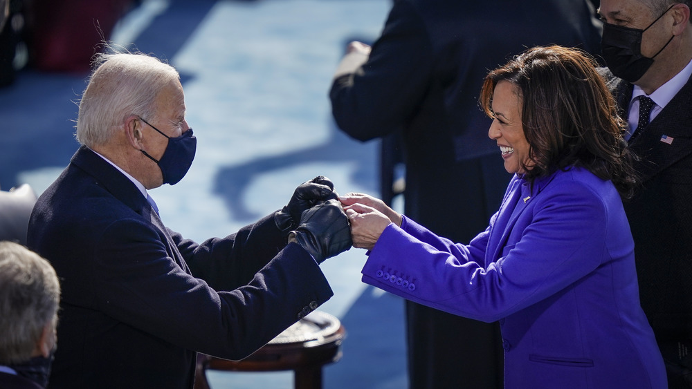 Biden and Harris fist bumping