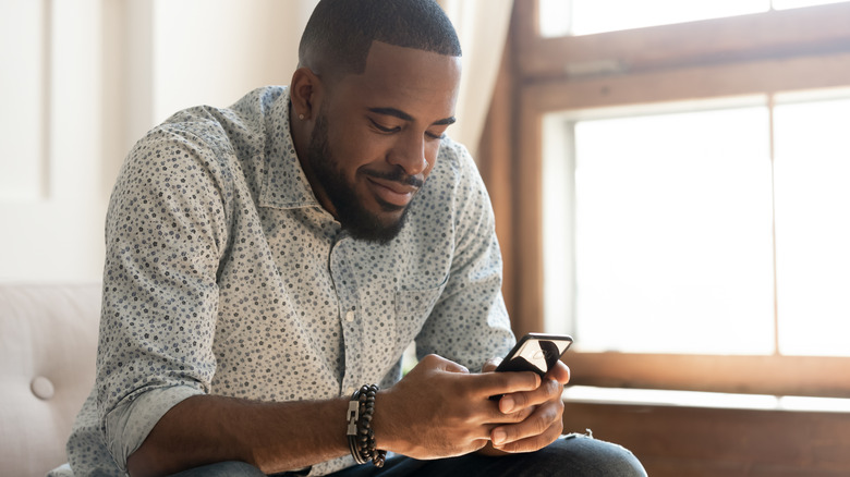 Man looking at phone