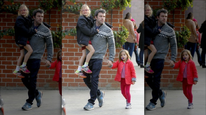 Ben Affleck walking with daughters in 2013