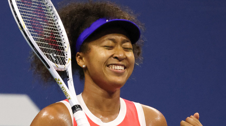 Naomi Osaka celebrates after a game