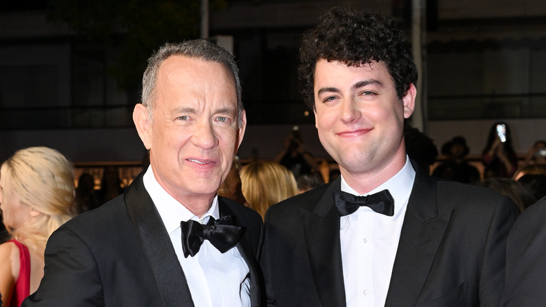 Tom Hanks and his son, Truman Hanks, smiling