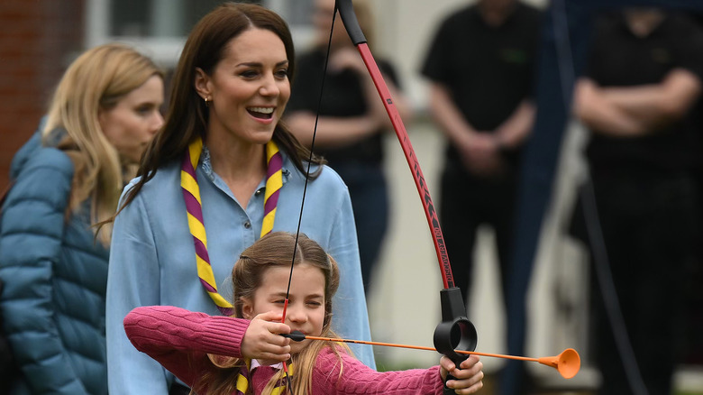 Kate Middleton cheers Princess Charlotte's archery