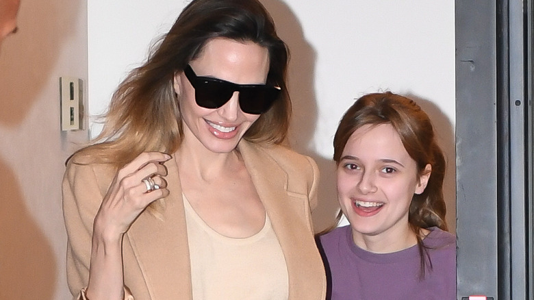 Angelina Jolie and Vivienne Jolie-Pitt walk through doorway together