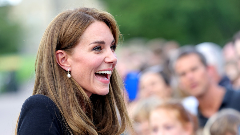 Kate Middleton with mourners outside Windsor  