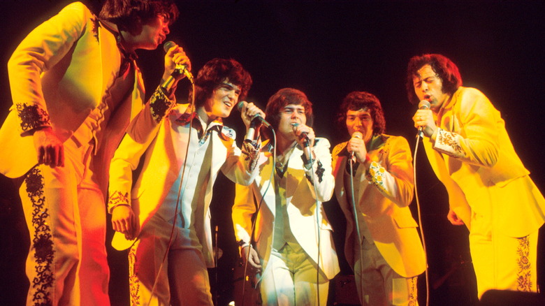 The Osmonds singing during a live performance 