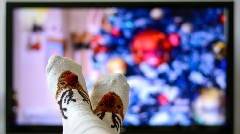 Reindeer socks in front of a TV