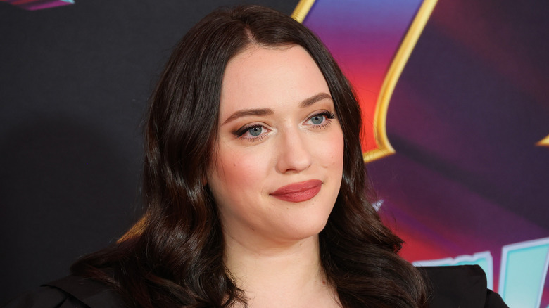 Kat Dennings posing at premiere