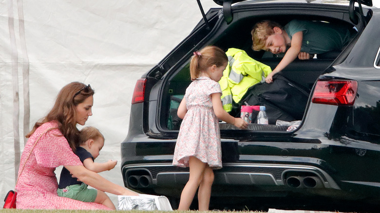 Princess Kate sitting with her children 