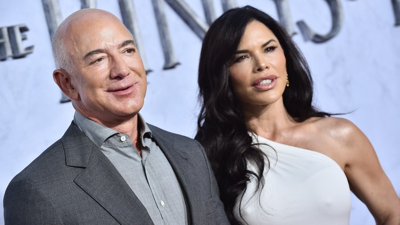 Jeff Bezos and Lauren Sanchez posing at a red carpet event