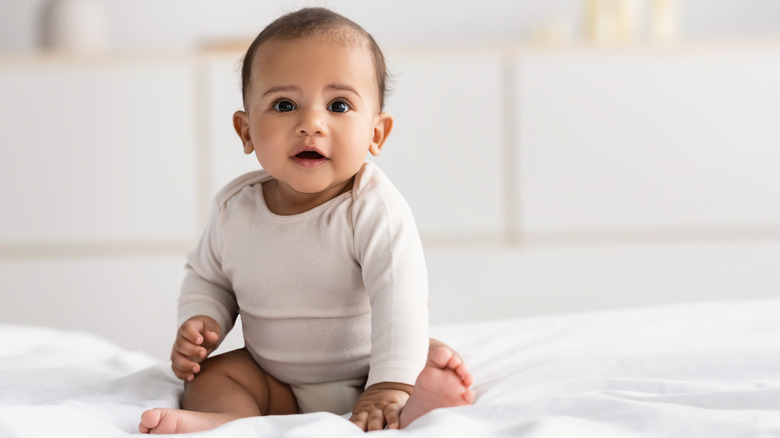 Cute baby boy sitting