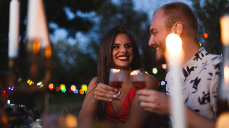 A couple at candlelit dinner