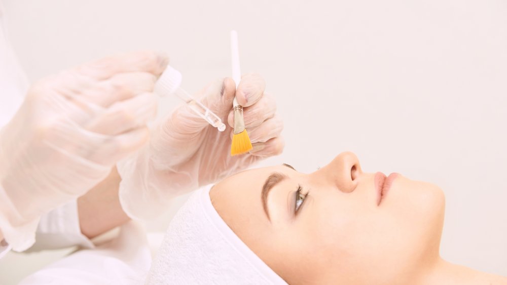 A woman getting a retinol treatment