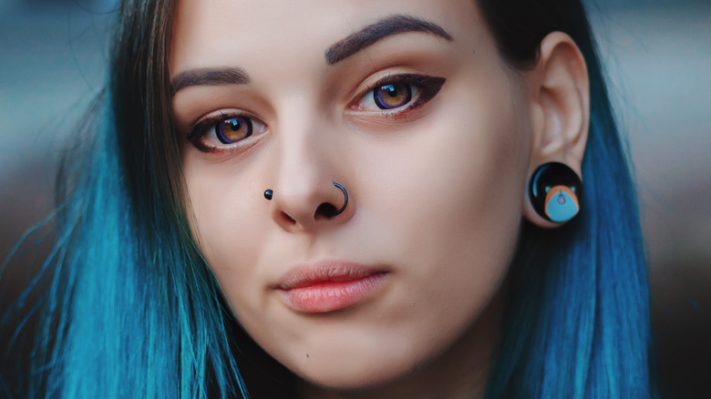 Woman with two nose piercings