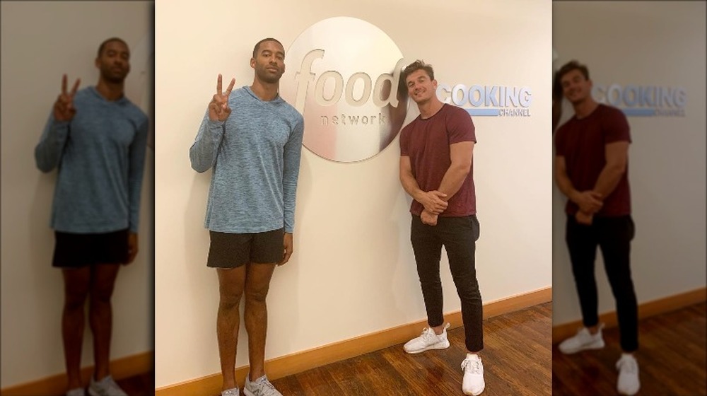 Matt James and Tyler Cameron pose at the Food Network