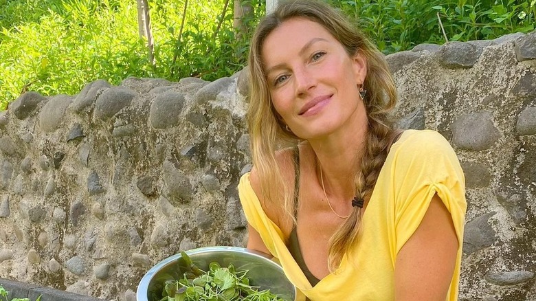 Gisele Bündchen harvesting greens from her garden