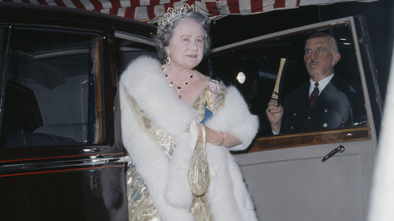 The Queen Mother exits car