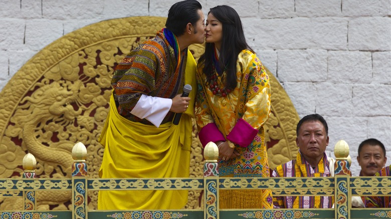 Queen Jetsun Pema and King Jigme Khesar Namgyel Wangchuck kissing