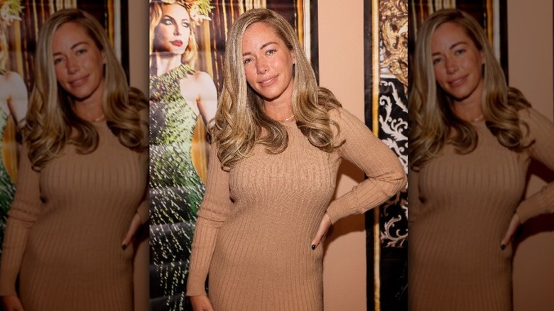 Kendra Wilkinson in beige dress