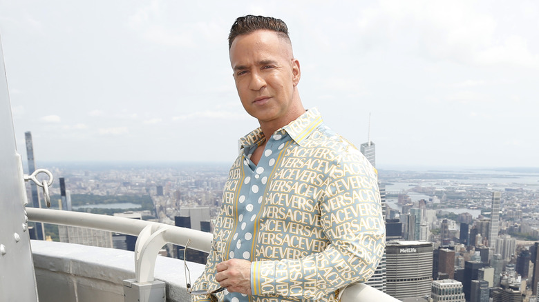 Mike "The Situation" Sorrentino posing on a balcony