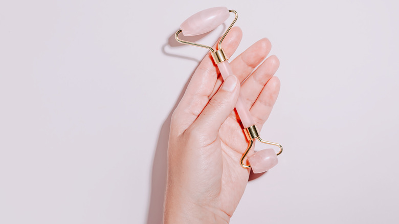 Woman holding Jade Roller