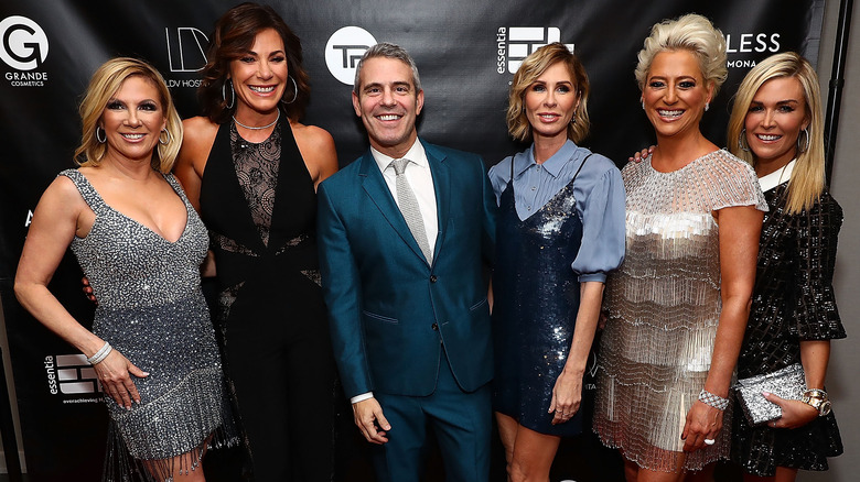 RHONY Season 10 cast poses with Andy Cohen