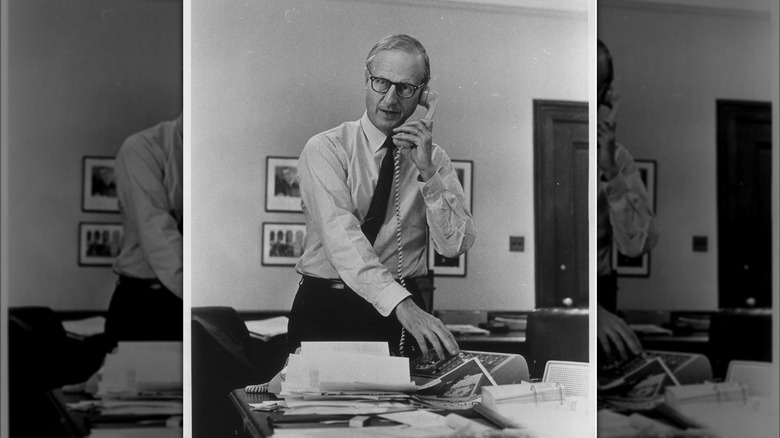 Robert Morgenthau on telephone