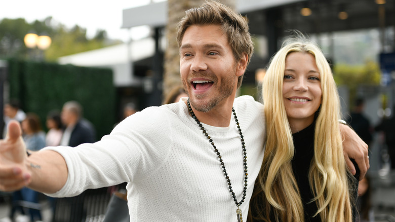 Chad Michael Murray laughing with Sarah Roemer