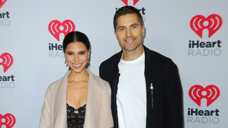 Eric Winter and Roselyn Sanchez smiling