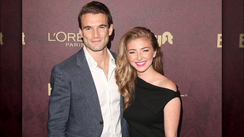 Alex Russell and Diana Hopper, both smiling