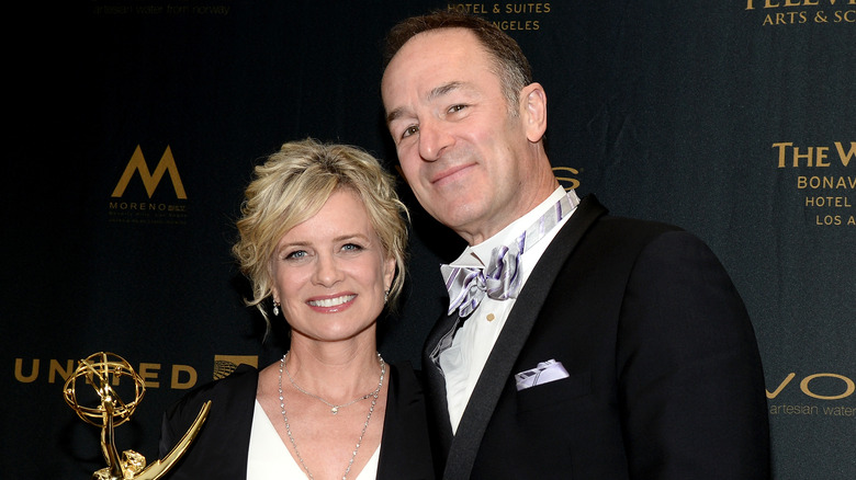 Mary Beth Evans holding award beside Dr. Michael Schwartz