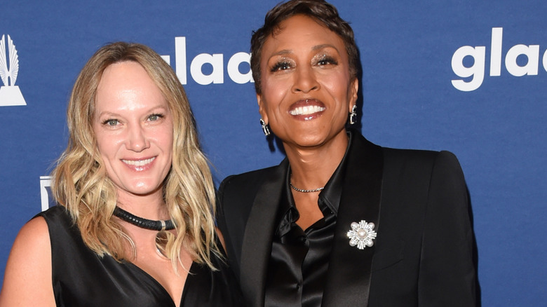 Amber Laign and Robin Roberts posing at an event