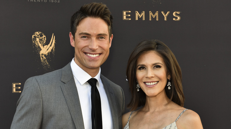 Whit Johnson and Andrea Fujii posing at the Emmys