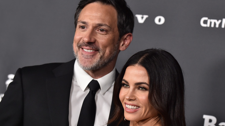 Jenna Dewan and Steve Kazee smiling at a press event